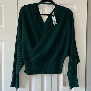 Dark green sweater! New with tags! Purchased from dry goods.